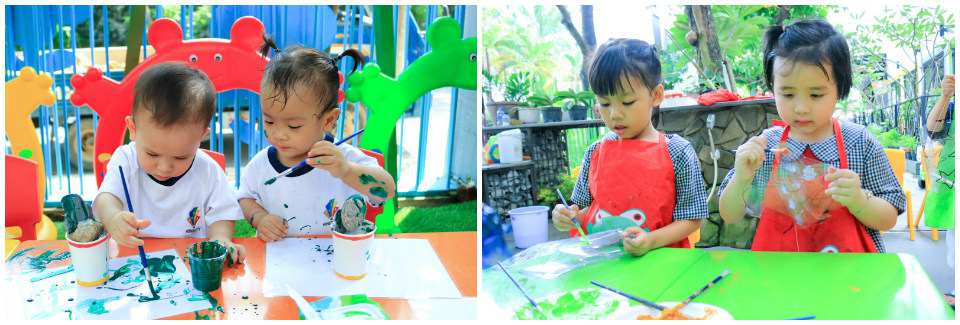 Trẻ tập trung hoàn thành tác phẩm của mình